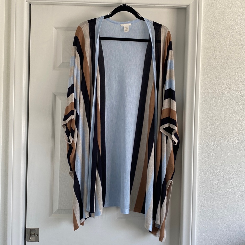 Long cardigan with bat like sleeves, lightweight really nice for the summer.